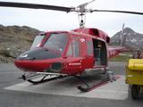 [Photo of Air Greenland helicopter]