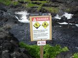 [Photo of danger sign]