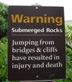 [Photo warning of submerged rocks]