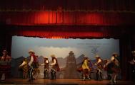 [Photo of folk dancing at the Centro Qosqo de Arte Nativo]