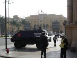 [Photo of Government Palace guards]