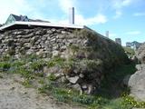 [Photo of turf house]