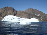 [Photo of iceberg]
