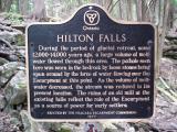 [Photo of the sign beside the pothole]