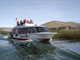 [Photo of tourist boat]