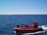 [Photo of a Zodiac boat in Georgian Bay off Flowerpot Island]